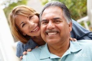 Older Hispanic Could Smiling and Embracing
