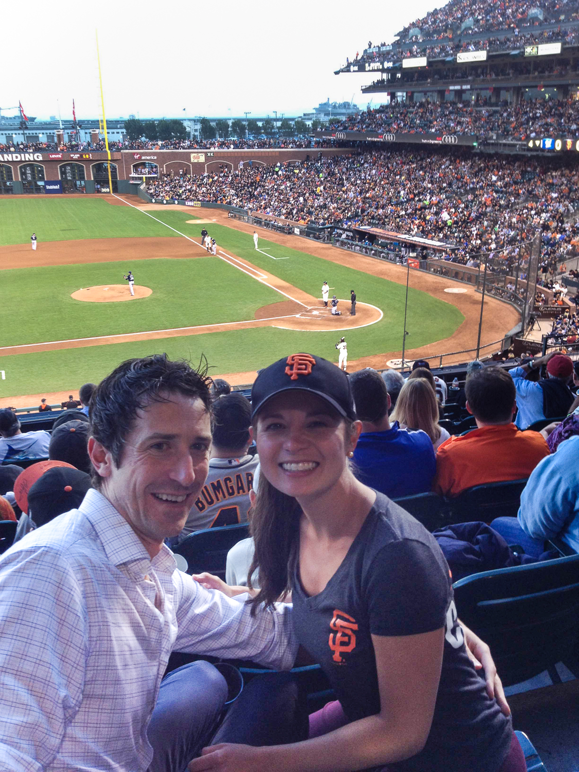 dr. Rittenbach with husband at a giants baseball game